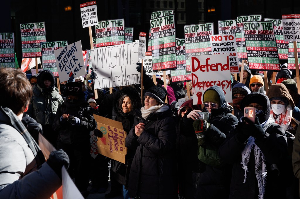 Hundreds Brave Frigid Temperatures During Inauguration Day March