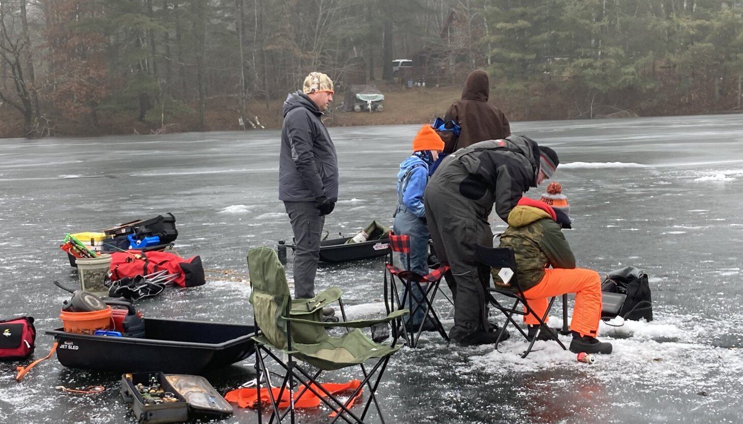 Ice Holds Tres Holes in Thrall as They Spread the Joy of Fishing